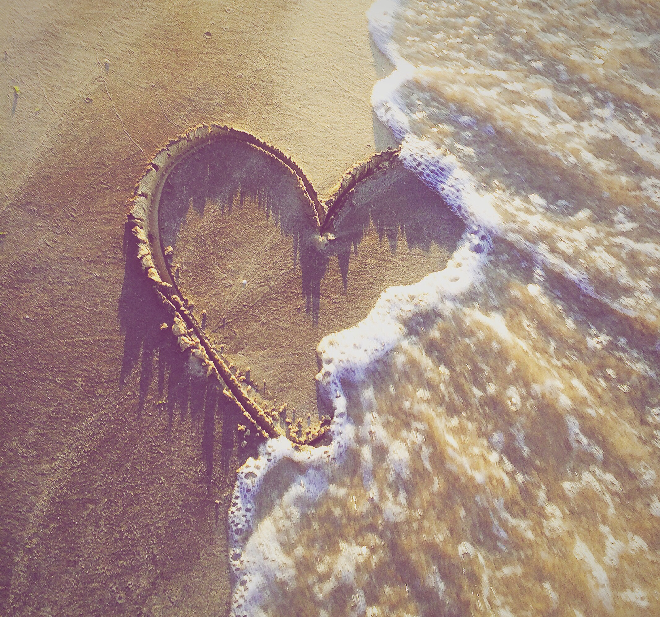 Heart drawn in the sand