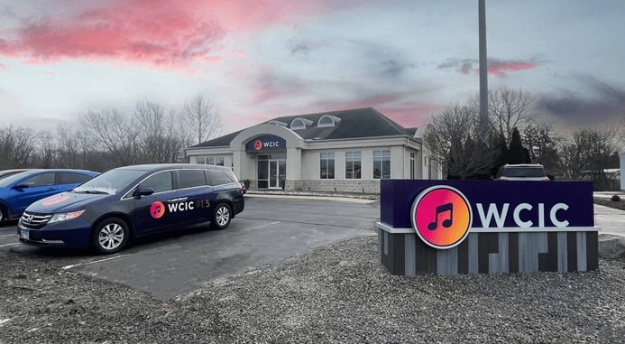 View of the parking lot and the WCIC radio station building