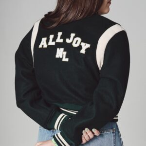 Natalie Layne in a black jacket that say All Joy on the back of it